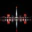 Phenian tonie w ciemnościach. Jedynym świetlistym punktem jest plac Kim Ir Sena. Obok stoi największ