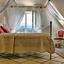 Sypialnia w Villa Toscana w Murzasichlu z widokiem na Tatry